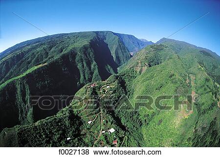 Stock Photo - Reunion, woody mountains inside the island, aerial view. Fotosearch