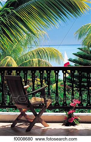 Stock Image - Mauritius, Grand Baie, balcony with sea view. Fotosearch