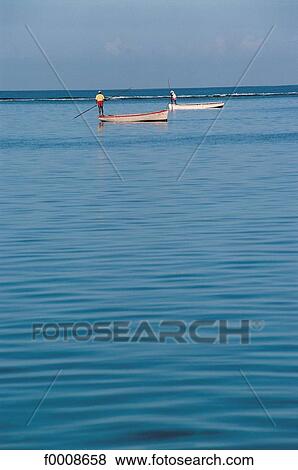 Stock Photo - Mauritius, Trou-aux-biches, fishermen. Fotosearch