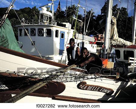 Seychelles, La Digue, boat in the port View Large Photo Image Stock Image - Seychelles, La Digue, boat in the port. Fotosearch