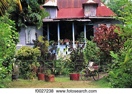 Seychelles, La Digue, colonial house View Large Photo Image Stock Photo - Seychelles, La Digue, colonial house. Fotosearch
