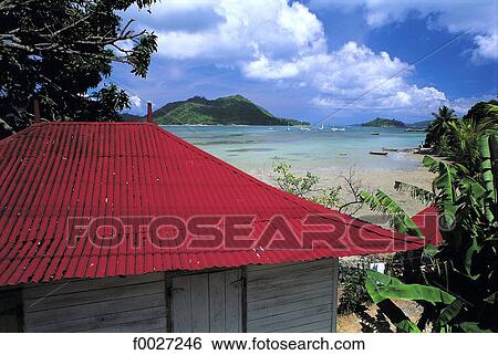 Seychelles, Praslin, costal landscape and corrugated roof View Large Photo Image Stock Photograph - Seychelles, Praslin, costal landscape and corrugated roof. Fotosearch