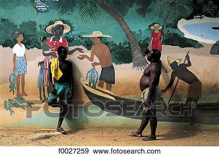 Seychelles, Praslin, man by a fresco View Large Photo Image Stock Photo - Seychelles, Praslin, man by a fresco. Fotosearch