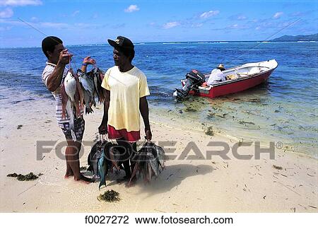 Stock Image - Seychelles, return from fishing. Fotosearch