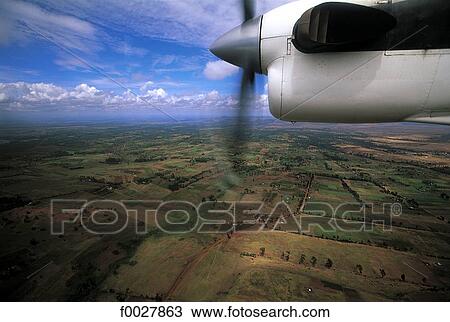 Kenya, propeller and Kenyan plains, aerial view View Large Photo Image Stock Image - Kenya, propeller and Kenyan plains, aerial view. Fotosearch