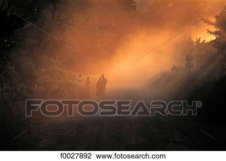 Tanzania, Manyara Region, dusty path at sunset View Large Photo Image Stock Image - Tanzania, Manyara Region, dusty path at sunset. Fotosearch