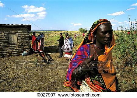 Tanzania, Manyara Region, Maasai women, market day View Large Photo Image Stock Photo - Tanzania, Manyara Region, Maasai women, market day. Fotosearch