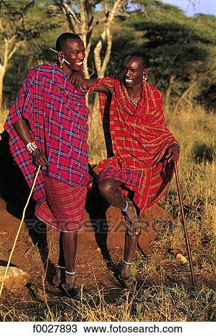Tanzania, portrait of two young Maasai View Large Photo Image Stock Image - Tanzania, portrait of two young Maasai. Fotosearch