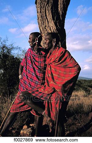 Tanzania, portrait of two young Maasai View Large Photo Image Stock Photo - Tanzania, portrait of two young Maasai. Fotosearch