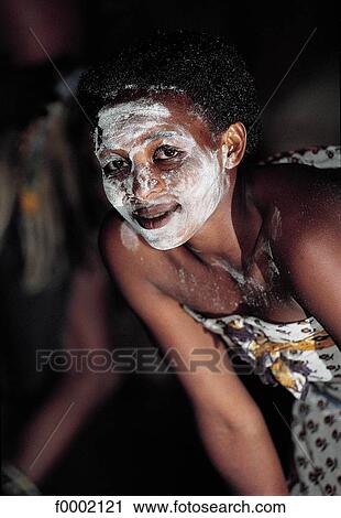Stock Image - Tanzania, Serengeti National Park, young woman. Fotosearch