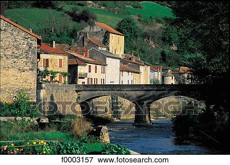 France, Aveyron, village whith its bridge and river View Large Photo Image Stock Photo - France, Aveyron, village whith its bridge and river. Fotosearch