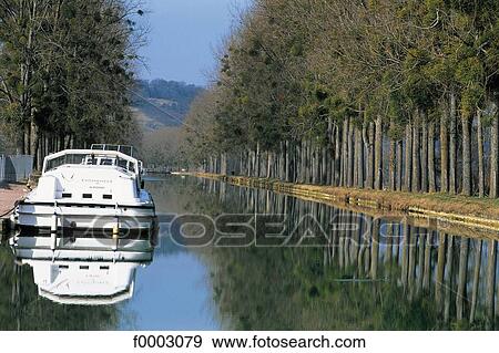 France, Burgundy, Burgundy canal View Large Photo Image Stock Photo - France, Burgundy, Burgundy canal. Fotosearch