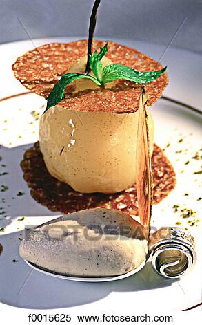 Stock Photography - France, Champagne region, Champignol, dessert with pears. Fotosearch