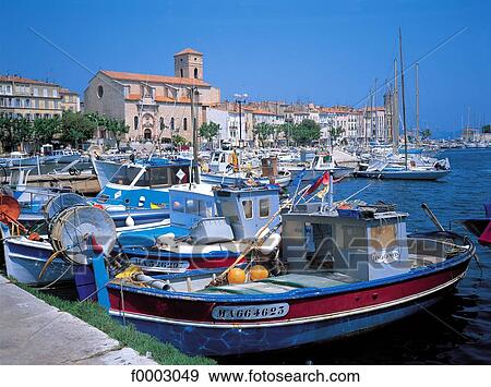 Stock Photo - France, Provence, La Ciotat, fishing boats in the harbour. Fotosearch