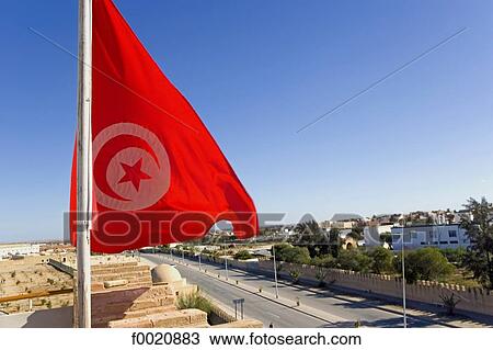 Tunisia, Kairouan, Tunisian flag View Large Photo Image Stock Image - Tunisia, Kairouan, Tunisian flag. Fotosearch