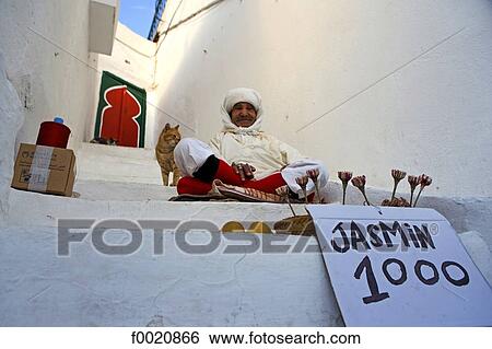 Stock Photograph - Tunisia, Sidi Bou Said, selling jasmine. Fotosearch