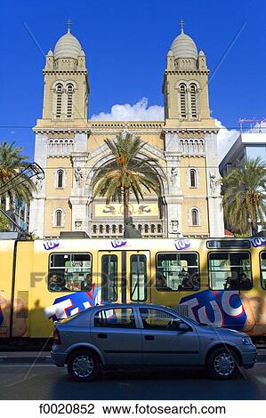 Tunisia, Tunis, traffic in front of Saint Vincent de Paul cathedral View Large Photo Image Stock Image - Tunisia, Tunis, traffic in front of Saint Vincent de Paul cathedral. Fotosearch