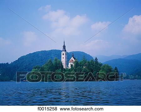 Stock Photo - Slovenia, Bled, lake and church on an island. Fotosearch