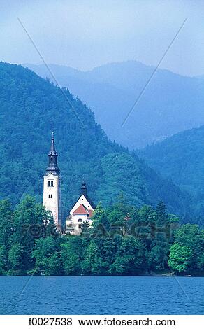 Stock Photo - Slovenia, Bled, lake and church on an island. Fotosearch