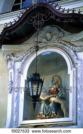 Stock Image - Slovenia, Lubiana, building facade, baroque altar with the Virgin. Fotosearch
