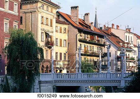 Slovenia, Lubiana, houses along the Ljubjanica River View Large Photo Image Stock Photo - Slovenia, Lubiana, houses along the Ljubjanica River. Fotosearch