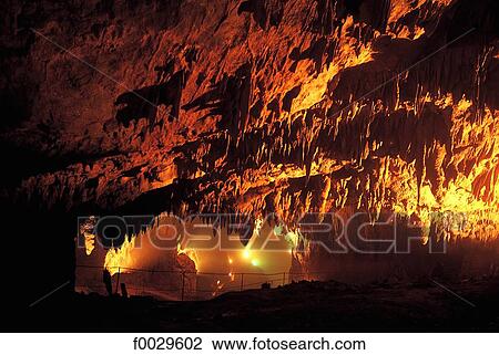 Stock Image - Slovenia, Skocjan, floodlit caves. Fotosearch