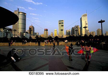 China, Shanghai, children playing with kites View Large Photo Image Stock Photography - China, Shanghai, children playing with kites. Fotosearch