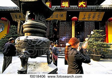 China, Shanghai, praying woman View Large Photo Image Stock Photograph - China, Shanghai, praying woman. Fotosearch