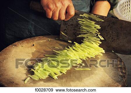 China, Shanghai, preparing vegetables for lunch View Large Photo Image Stock Photo - China, Shanghai, preparing vegetables for lunch. Fotosearch