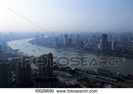 Stock Image - China, Shanghai, Pudong and Huangpu River. Fotosearch