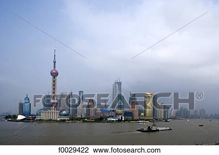 Stock Image - China, Shanghai, Pudong and Huangpu River. Fotosearch