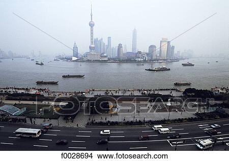 China, Shanghai, the Bund promenade, Huangpu River and Pudong View Large Photo Image Picture - China, Shanghai, the Bund promenade, Huangpu River and Pudong. Fotosearch