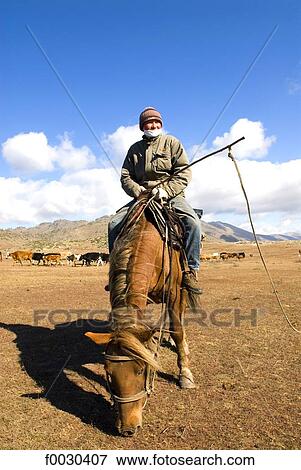 China, Xinjiang, Altay Massif, horseback Kazak shepherd View Large Photo Image Stock Photo - China, Xinjiang, Altay Massif, horseback Kazak shepherd. Fotosearch