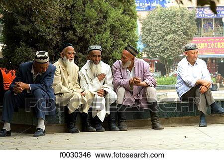China, Xinjiang, kashgar, group of Uyghur men View Large Photo Image Stock Photograph - China, Xinjiang, kashgar, group of Uyghur men. Fotosearch