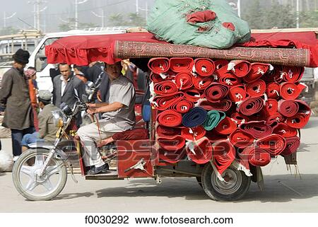 China, Xinjiang, Keriya, carpets transportation View Large Photo Image Stock Image - China, Xinjiang, Keriya, carpets transportation. Fotosearch