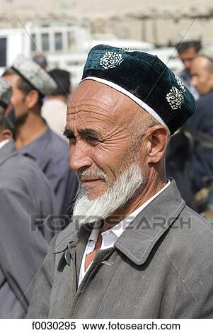 Stock Photography - China, Xinjiang, Keriya, Uyghur man. Fotosearch