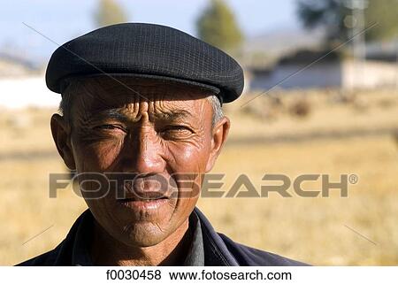 China, Xinjiang, north of Hami, portrait of a Kazak View Large Photo Image Stock Photo - China, Xinjiang, north of Hami, portrait of a Kazak. Fotosearch