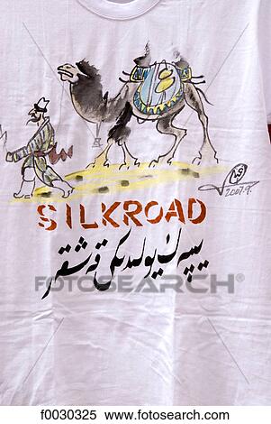 Stock Photography - China, Xinjiang, souvenir tee-shirt. Fotosearch