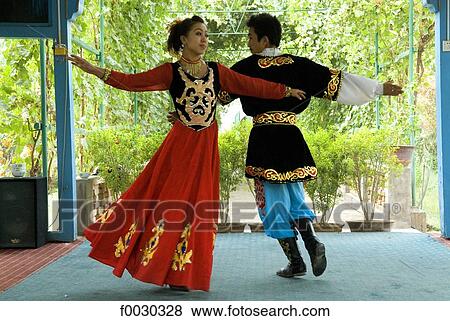 Stock Photo - China, Xinjiang, traditional Uyghur dance. Fotosearch