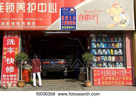 Stock Photo - China, Xinjiang, Urumqi, garage. Fotosearch