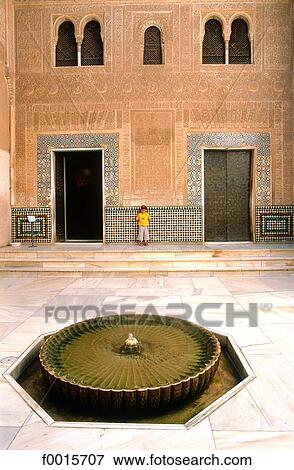 Stock Photo - Spain, Andalusia, Granada, the Alhambra, patio and fountain. Fotosearch