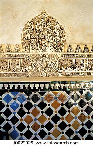 Stock Photography - Spain, Andalusia, Granada, the Alhambra, patio de los Arrayanes (court of the myrtles), close-up on a wall. Fotosearch