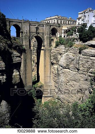 Spain, Andalusia, Ronda, bridge over the canyon View Large Photo Image Stock Photo - Spain, Andalusia, Ronda, bridge over the canyon. Fotosearch