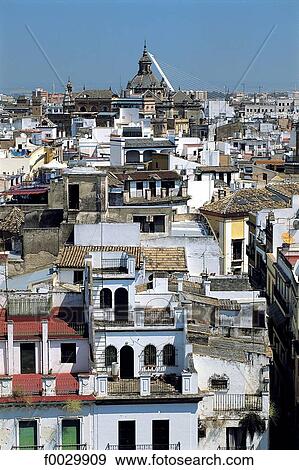 Stock Photo - Spain, Andalusia, Seville, overview on the city roofs. Fotosearch