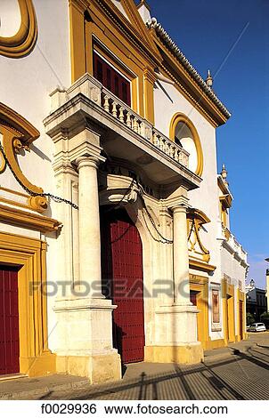 Stock Photograph - Spain, Andalusia, Seville, plaza deToros de la Maestranza, facade and porch. Fotosearch