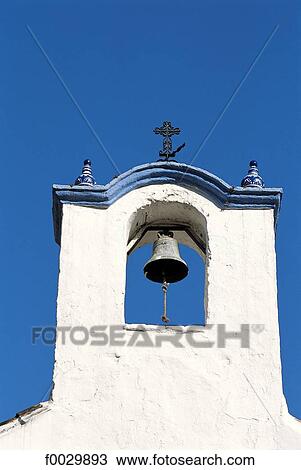 Spain, Andalusia, white village, church belfry and bell against blue sky View Large Photo Image Stock Image - Spain, Andalusia, white village, church belfry and bell against blue sky. Fotosearch