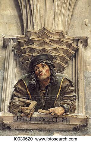 Stock Image - Austria, Vienna, Saint Stephen's cathedral, gothic sculpture, self-portrait of an architect. Fotosearch