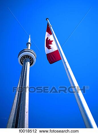 Canada, Ontario, Toronto, CN tower et drapeau canadien View Large Photo Image Stock Image - Canada, Ontario, Toronto, CN tower et drapeau canadien. Fotosearch
