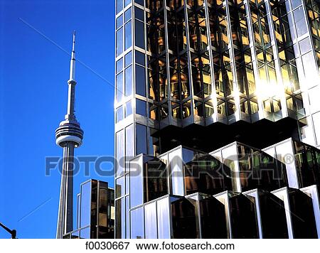 Canada, Ontario, Toronto, CN Tower et immeuble moderne View Large Photo Image Stock Photo - Canada, Ontario, Toronto, CN Tower et immeuble moderne. Fotosearch