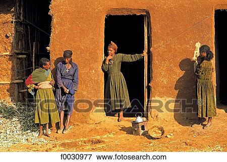 Ethiopia, near Bahar Dar, Amhara women by traditional house View Large Photo Image Stock Photo - Ethiopia, near Bahar Dar, Amhara women by traditional house. Fotosearch